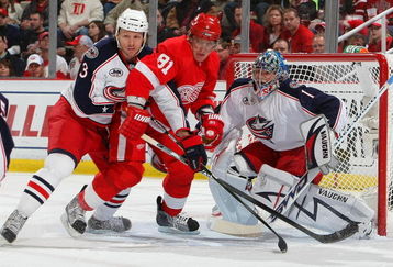 DETROIT - APRIL 16:  Steve Mason #1 of the Columbus Blue Jackets positions himself to make a save as teammate Marc Methot #3 battles for position with Marian Hossa #81 of the Detroit Red Wings during Game One of the Western Conference Quarterfinals of the 2009 Stanley Cup Playoffs on April 16, 2009 at Joe Louis Arena in Detroit, Michigan.(Photo By Dave Sandford/Getty Images)