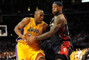 LOS ANGELES, CA - JANUARY 19:  LeBron James #23 of the Cleveland Cavaliers attempts to steal the ball from Kobe Bryant #24 of the Los Angeles Lakers during the forth quarter at Staples Center on January 19, 2009 in Los Angeles, California.  (Photo by Harry How/Getty Images)