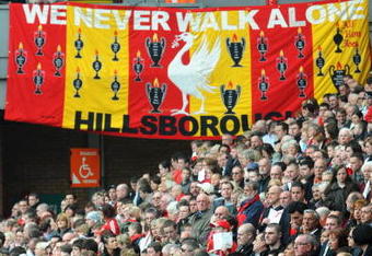 LIVERPOOL, ENGLAND - APRIL 15:  Liverpool supporters in the Kop attend the the Hillsborough memorial service at Anfield on April 15, 2009, Liverpool, England. Thousands of fans, friends and relatives descended on Liverpool's Anfield Stadium to mark the 20th anniversary of the Hillsborough disaster. A total of 96 Liverpool supporters lost their lives during a crush at an FA Cup semi final against Nottingham Forest at the Hillsborough football ground in Sheffield, South Yorkshire in 1989. (Photo by Jim Dyson/Getty Images)