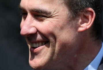 CHICAGO - JUNE 27:  John Paxson, ganeral manager of the Chicago Bulls, smiles in the dugout prior to the MLB Interleague game between the Chicago Cubs and the Chicago White Sox at U.S. Cellular Field on June 27, 2008 in Chicago, Illinois.  (Photo by Jonathan Daniel/Getty Images)