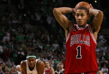 BOSTON - APRIL 18:  Rajon Rondo #9 of the Boston Celtics looks on as Derrick Rose #1 of the Chicago Bulls prepares to shoot a free throw in the final minute of overtime in Game One of the Eastern Conference Quarterfinals during the 2009 NBA Playoffs at TD Banknorth Garden on April 18, 2009 in Boston, Massachusetts. Rondo was called for fouling Rose. The Chicago Bulls defeated the Boston Celtics 105-103 in overtime. NOTE TO USER: User expressly acknowledges and agrees that, by downloading and or using this photograph, User is consenting to the terms and conditions of the Getty Images License Agreement. (Photo by Elsa/Getty Images)