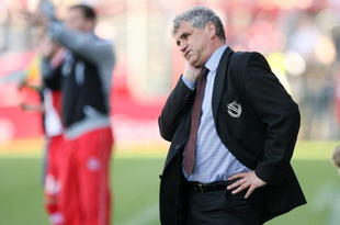 COTTBUS, GERMANY - APRIL 26:  Coach Bojan Prasnikar of Cottbus looks on during the Bundesliga match between FC Energie Cottbus and FC Hansa Rostock at the Stadion der Freundschaft on April 26, 2008 in Cottbus, Germany. (Photo by Matthias Kern/Bongarts/Getty Images)