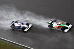 SHANGHAI, CHINA - APRIL 19:  Adrian Sutil (R) of Germany and Force India and Robert Kubica (L) of Poland and BMW Sauber drive during the Chinese Formula One Grand Prix at the Shanghai International Circuit on April 19, 2009 in Shanghai, China.  (Photo by Clive Mason/Getty Images)