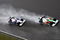 SHANGHAI, CHINA - APRIL 19:  Adrian Sutil (R) of Germany and Force India and Robert Kubica (L) of Poland and BMW Sauber drive during the Chinese Formula One Grand Prix at the Shanghai International Circuit on April 19, 2009 in Shanghai, China.  (Photo by Clive Mason/Getty Images)