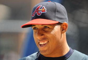 ATLANTA - APRIL 12: Infielder Yunel Escobar #19 of the Atlanta Braves watches batting practice before play against the Washington Nationals April 12, 2009 at Turner Field in Atlanta, Georgia.  (Photo by Al Messerschmidt/Getty Images)