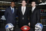 DETROIT , MI - JANUARY 16:  Jim Schwartz, center, head coach of the Detroit Lions poses with General Manager Martin Mayhew, left, and Tom Lewand team president after a press conference to introduce him as the Lions new head coach on January 16, 2009 at Ford Field in Detroit, Michigan.  (Photo by Gregory Shamus/Getty Images)