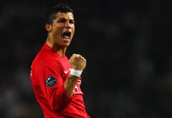PORTO, PORTUGAL - APRIL 15:  Cristiano Ronaldo of Manchester United celebrates following the UEFA Champions League Quarter Final second leg match between FC Porto and Manchester United at the Estadio do Dragao on April 15, 2009 in Porto, Portugal.  (Photo by Laurence Griffiths/Getty Images)