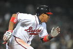 ATLANTA - APRIL 10: Infielder Yunel Escobar #19 of the Atlanta Braves runs out a hit against the Washington Nationals April 10, 2009 in Atlanta, Georgia.  (Photo by Al Messerschmidt/Getty Images) 