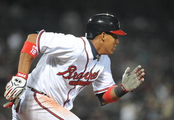 ATLANTA - APRIL 10: Infielder Yunel Escobar #19 of the Atlanta Braves runs out a hit against the Washington Nationals April 10, 2009 in Atlanta, Georgia.  (Photo by Al Messerschmidt/Getty Images) 