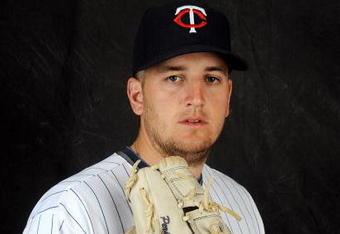 FORT MYERS, FL - FEBRUARY 23: Glen Perkins #15 of the Minnesota Twins poses during photo day at the Twins spring training complex on February 23, 2008 in Fort Myers, Florida. (Photo by Rob Tringali/Getty Images)