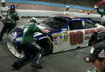 AVONDALE, AZ - APRIL 18: Dale Earnhardt Jr., driver of the #88 National Guard/AMP Energy Chevrolet, pits during the NASCAR Sprint Cup Series SUBWAY Fresh Fit 500 at Phoenix International Raceway on April 18, 2009 in Avondale, AZ.  (Photo by Jerry Markland/Getty Images for NASCAR)