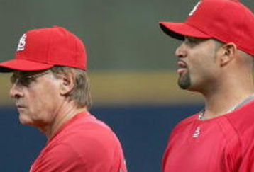MILWAUKEE - APRIL 30: Manager Tony LaRussa of the St. Louis Cardinals talks with Albert Pujols #5 during batting practice before a game against the Milwaukee Brewers on April 30, 2007 at Miller Park in Milwaukee, Wisconsin. (Photo by Jonathan Daniel/Getty Images)