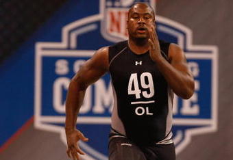 INDIANAPOLIS, IN - FEBRUARY 21:  Offensive lineman Jason Smith of Baylor runs the 40 yard dash during the NFL Scouting Combine presented by Under Armour at Lucas Oil Stadium on February 21, 2009 in Indianapolis, Indiana. (Photo by Scott Boehm/Getty Images)