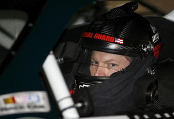 ATLANTA - MARCH 06:  Dale Earnhardt, Jr., driver of the #88 AMP Energy/National Guard Chevrolet, sits in his car during qualifying for the NASCAR Sprint Cup Series Kobalt Tools 500 at the Atlanta Motor Speedway on March 6, 2009 in Hampton, Georgia.  (Photo by Geoff Burke/Getty Images for NASCAR)