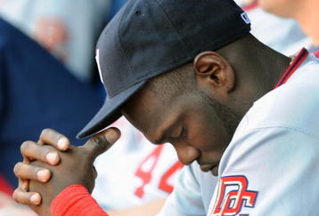 ATLANTA - APRIL 12: Outfielder Elijah Dukes #34 of the Washington Nationals ponders three loses against the Atlanta Braves April 12, 2009 at Turner Field in Atlanta, Georgia.  (Photo by Al Messerschmidt/Getty Images)