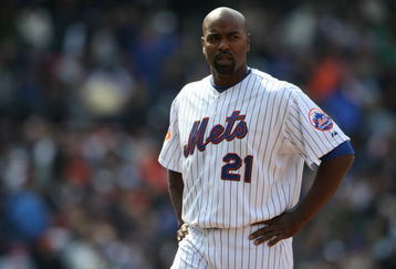NEW YORK - APRIL 19: Carlos Delgado #21 of the New York Mets stands in the field after grounding into a double play with bases loaded against the Milwaukee Brewers at Citi Field on April 19, 2009 in the Flushing neighborhood of the Queens borough of New York City.  (Photo by Nick Laham/Getty Images)