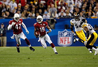 TAMPA, FL - FEBRUARY 01:  Steve Breaston #15 of the Arizona Cardinals returns a punt against the Pittsburgh Steelers during Super Bowl XLIII on February 1, 2009 at Raymond James Stadium in Tampa, Florida. Steelers won 27-23. (Photo by Chris Graythen/Getty Images)