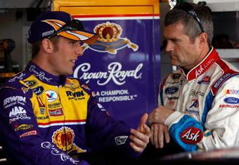 AVONDALE, AZ - APRIL 17:  Jamie McMurray (L), driver of the #26 Crown Royal Ford talks with Bobby Labonte, driver of the #96 ASK.com Ford during practice for the NASCAR Sprint Cup Series SUBWAY Fresh Fit 500 at Phoenix International Raceway on April 17, 2009 in Avondale, AZ.  (Photo by Chris Graythen/Getty Images for NASCAR)