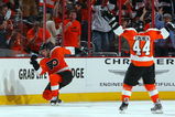 PHILADELPHIA - APRIL 19:  Jeff Carter #17 of the Philadelphia Flyers celebrates his first period goal against the Pittsburgh Penguins with teammate Kimmo Timonen #44 during Game Three of the Eastern Conference Quarterfinal Round of the 2009 NHL Stanley Cup Playoffs  at the Wachovia Center on April 19, 2009 in Philadelphia, Pennsylvania.  (Photo by Jim McIsaac/Getty Images)