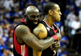 ORLANDO, FL - APRIL 19: Andre Iguodala #9 (R) of the Philadelphia 76ers is hugged by Reggie Evans #30 after making the game winning basket in Game One of the Eastern Conference Quarterfinals during the 2009 NBA Playoffs at Amway Arena on April 19, 2009 in Orlando, Florida.  NOTE TO USER: User expressly acknowledges and agrees that, by downloading and/or using this Photograph, user is consenting to the terms and conditions of the Getty Images License Agreement.  (Photo by Sam Greenwood/Getty Images)