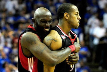 ORLANDO, FL - APRIL 19: Andre Iguodala #9 (R) of the Philadelphia 76ers is hugged by Reggie Evans #30 after making the game winning basket in Game One of the Eastern Conference Quarterfinals during the 2009 NBA Playoffs at Amway Arena on April 19, 2009 in Orlando, Florida.  NOTE TO USER: User expressly acknowledges and agrees that, by downloading and/or using this Photograph, user is consenting to the terms and conditions of the Getty Images License Agreement.  (Photo by Sam Greenwood/Getty Images)