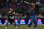 CAPE TOWN, SOUTH AFRICA - APRIL 19:  Rohit Sharma of Deccan Chargers hits out at Brendon McCullum of Kolkata looks on during the IPL T20 match between Deccan Chargers and Kolkata Knight Riders on April 19, 2009 in Cape Town, South Africa.  (Photo by Tom Shaw/Getty Images)