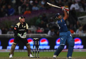 CAPE TOWN, SOUTH AFRICA - APRIL 19:  Rohit Sharma of Deccan Chargers hits out at Brendon McCullum of Kolkata looks on during the IPL T20 match between Deccan Chargers and Kolkata Knight Riders on April 19, 2009 in Cape Town, South Africa.  (Photo by Tom Shaw/Getty Images)