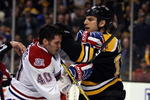 BOSTON - APRIL 18:  Milan Lucic #17 of the Boston Bruins and Maxim Lapierre #40 of the Montreal Canadiens mix it up during Game Two of the Eastern Conference Quarterfinals of the 2009 Stanley Cup playoffs on April 18, 2009 at the TD Banknorth Garden in Boston, Massachusetts. The Bruins defeated the Canadiens 5-1.  (Photo by Elsa/Getty Images)