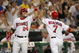 WASHINGTON - AUG 4: Brad Wilkerson #7 of the Washington Nationals is congratulated by Nick Johnson #24 after hitting the first ever Washington Nationals grand slam home run during the 8th inning of a game against the Los Angeles Dodgers August 4, 2005 at RFK Stadium in Washington, DC. (Photo By Jamie Squire/Getty Images)