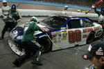 AVONDALE, AZ - APRIL 18: Dale Earnhardt Jr., driver of the #88 National Guard/AMP Energy Chevrolet, pits during the NASCAR Sprint Cup Series SUBWAY Fresh Fit 500 at Phoenix International Raceway on April 18, 2009 in Avondale, AZ.  (Photo by Jerry Markland/Getty Images for NASCAR)