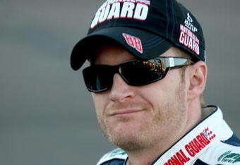 AVONDALE, AZ - APRIL 18: Dale Earnhardt Jr., driver of the #88 National Guard/AMP Energy Chevrolet, stands on the grid prior to the start of the NASCAR Sprint Cup Series SUBWAY Fresh Fit 500 at Phoenix International Raceway on April 18, 2009 in Avondale, AZ.  (Photo by Stephen Dunn/Getty Images for NASCAR)