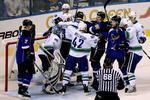 ST LOUIS, MO - APRIL 19:  Members of the St Louis Blues and the Vancouver Canucks fight in the first period during Game Three of the Western Conference Quarterfinal Round of the 2009 Stanley Cup Playoffs on April 19, 2009 at Scottrade Center in St. Louis, Missouri. (Photo by Matthew Stockman/Getty Images)