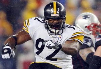 FOXBORO, MA - NOVEMBER 30:  James Harrison #92 of the Pittsburgh Steelers celebrates after the Steelers recovered a fumble by the New England Patriots on November 30, 2008 at Gillette Stadium in Foxboro, Massachusetts.  (Photo by Elsa/Getty Images)