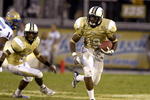 ORLANDO, FL - OCTOBER 20:  Defensive back Joe Burnett #19 of the University of Central Florida Golden Knights returns a kick against the Tulsa Golden Hurricane at Bright House Stadium on October 20, 2007 in Orlando, Florida.  (Photo by Al Messerschmidt/Getty Images)