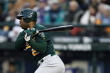 SEATTLE - APRIL 4:  Shannon Stewart #24 of the Oakland Athletics swings during the opening day game against the Seattle Mariners on April 4, 2007 at Safeco Field in Seattle, Washington.  The A's won 9-0.  (Photo by Otto Greule Jr/Getty Images)
