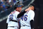 NEW YORK - APRIL 04:  Brian Schneider #23 of the New York Mets talks with teammate Oliver Perez #46 during the first inning against the Boston Red Sox on April 4, 2009 at Citi Field in the Flushing neighborhood of the Queens borough of New York City.  (Photo by Jim McIsaac/Getty Images)