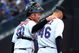 NEW YORK - APRIL 04:  Brian Schneider #23 of the New York Mets talks with teammate Oliver Perez #46 during the first inning against the Boston Red Sox on April 4, 2009 at Citi Field in the Flushing neighborhood of the Queens borough of New York City.  (Photo by Jim McIsaac/Getty Images)