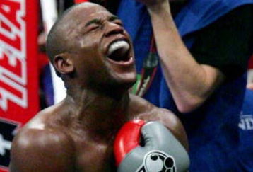 LAS VEGAS - DECEMBER 08:  Floyd Mayweather Jr. celebrates his 10th round knockout of Ricky Hatton after their WBC world welterweight championship fight at the MGM Grand Garden Arena on December 8, 2007 in Las Vegas, Nevada.  (Photo by Ethan Miller/Getty Images)