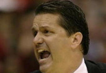 SAN ANTONIO - MARCH 22:  Head coach John Calipari of Memphis Tigers yells as he coaches against the Texas A&M Aggies during the round of 16 of the NCAA Men's Basketball Tournament at the Alamodome March 22, 2007 in San Antonio, Texas. Memphis won 65-64.  (Photo by Ronald Martinez/Getty Images)