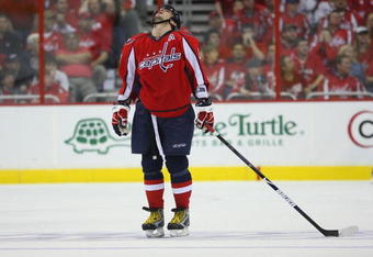 WASHINGTON - APRIL 18: Alex Ovechkin #8 of the Washington Capitals looks up after missing a third period shot against the New York Rangers during Game Two of the Eastern Conference Quarterfinal Round of the 2009 NHL Stanley Cup Playoffs at Verizon Center on April 18, 2009 in Washington, DC. The Rangers defeated the Capitals 1-0. (Photo by Bruce Bennett/Getty Images)