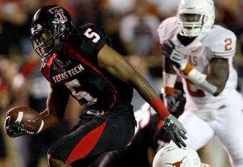 LUBBOCK, TX - NOVEMBER 01:  Michael Crabtree #5 of the Texas Tech Red Raiders carries the ball after making a reception during the first half of the game against the Texas Longhorns on November 1, 2008 at Jones Stadium in Lubbock, Texas.  (Photo by Jamie Squire/Getty Images)
