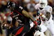 LUBBOCK, TX - NOVEMBER 01:  Michael Crabtree #5 of the Texas Tech Red Raiders carries the ball after making a reception during the first half of the game against the Texas Longhorns on November 1, 2008 at Jones Stadium in Lubbock, Texas.  (Photo by Jamie Squire/Getty Images)