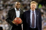 DETROIT - APRIL 06:  Larry Bird (R) and Earvin 'Magic' Johnson walk on the court to be honored for the 30th anniversary of their match up in 1979 NCAA Championship Game between Indiana State and Michigan State prior to the Michigan State Spartans playing against the North Carolina Tar Heels during the 2009 NCAA Division I Men's Basketball National Championship game at Ford Field on April 6, 2009 in Detroit, Michigan.  (Photo by Andy Lyons/Getty Images)
