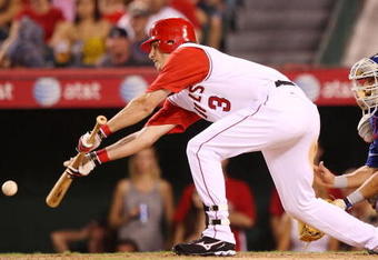 ANAHEIM, CA - AUGUST 30:  Brandon Wood #3 of the Los Angeles Angels of Anaheim bunts a RBI single in the fifth inning against the Texas Rangers at Angels Stadium on August 30, 2008 in Anaheim, California.  (Photo by Lisa Blumenfeld/Getty Images)