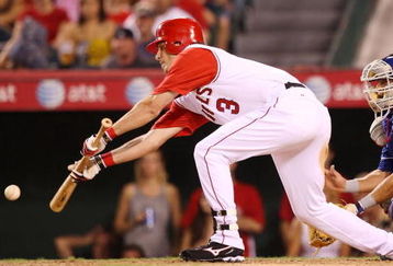 ANAHEIM, CA - AUGUST 30:  Brandon Wood #3 of the Los Angeles Angels of Anaheim bunts a RBI single in the fifth inning against the Texas Rangers at Angels Stadium on August 30, 2008 in Anaheim, California.  (Photo by Lisa Blumenfeld/Getty Images)