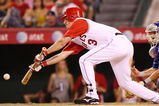ANAHEIM, CA - AUGUST 30:  Brandon Wood #3 of the Los Angeles Angels of Anaheim bunts a RBI single in the fifth inning against the Texas Rangers at Angels Stadium on August 30, 2008 in Anaheim, California.  (Photo by Lisa Blumenfeld/Getty Images)