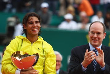 MONTE CARLO, MONACO - APRIL 19:  Rafael Nadal (l) of Spain holds the winners trophy alongside Prince Albert II of Monaco (r) after his 6-3,2-6,6-1 victory in the final match against Novak Djokovic of Serbia during day seven of the ATP Masters Series at the Monte Carlo Country Club on April 19, 2009 in Monte Carlo,Monaco.  (Photo by Michael Steele/Getty Images)