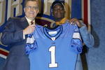 NEW YORK CITY - APRIL 26:  Charles Rogers from Michigan State was selected second overall by the Detroit Lions with NFL Commissioner Paul Tagliabue at the 2003 NFL Draft on April 26, 2003 at Madison Square Garden in New York City. (Photo by Ezra Shaw/Getty Images)