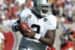 TAMPA, FL - DECEMBER 28: Quarterback JaMarcus Russell #2 of the Oakland Raiders looks upfield against the Tampa Bay Buccaneers at Raymond James Stadium on December 28, 2008 in Tampa, Florida.  (Photo by Al Messerschmidt/Getty Images)