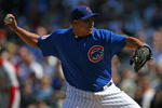 CHICAGO - APRIL 17: Starting pitcher Carlos Zambrano #38 of the Chicago Cubs delivers the ball against the St. Louis Cardinals on April 17, 2009 at Wrigley Field in Chicago, Illinois. (Photo by Jonathan Daniel/Getty Images)
